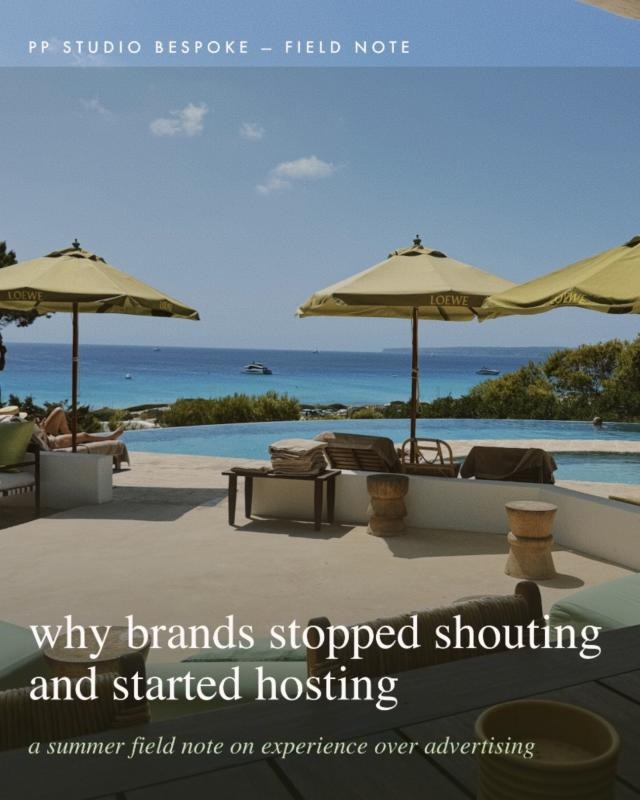 Loewe umbrellas around the pool at Dunas de Formentera, above the sea, with the title why brands stopped shouting and started hosting