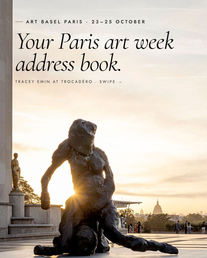 Tracey Emin sculpture at the Trocadéro at sunrise, with the Paris skyline behind